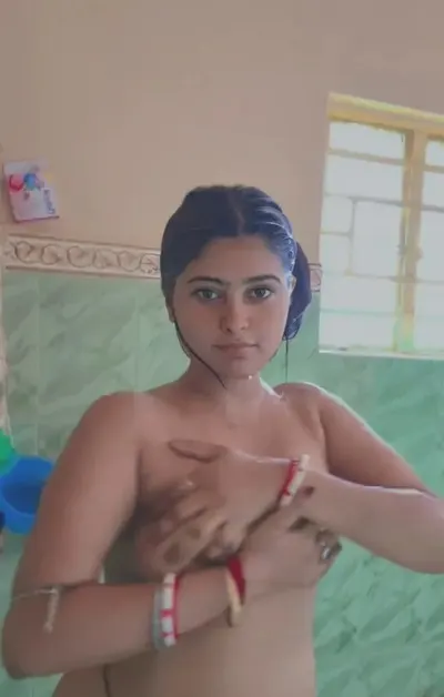 Desi Bhabhi Strip Bathing Shows Off Boobs And Presses Them with Horny Moves